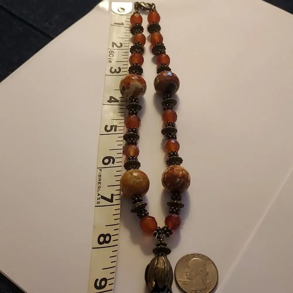 Handmade boho necklace beaded rust brown and bronze collar charm pendant